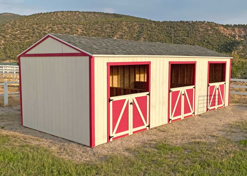 A three stall Tall Apex Loafing sheds with custom gates
